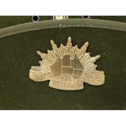 331 - Militaria : A late 20thC Australian ' Slouch Hat ' having applied sunburst badge to the upturned bri... 