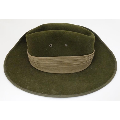 331 - Militaria : A late 20thC Australian ' Slouch Hat ' having applied sunburst badge to the upturned bri... 