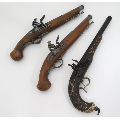 333 - Militaria : An Eastern Muzzleloading Flintlock pistol , the stock decorated with yellow metal inlay ... 