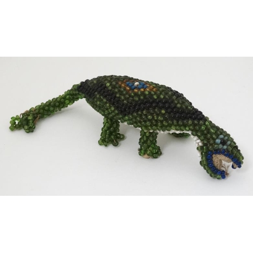 346 - Militaria : An Ottoman Prisoner of War small bead work Lizard , 6 1/2'' long .