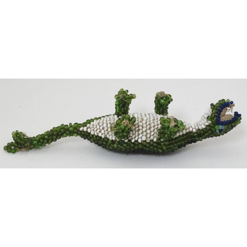 346 - Militaria : An Ottoman Prisoner of War small bead work Lizard , 6 1/2'' long .