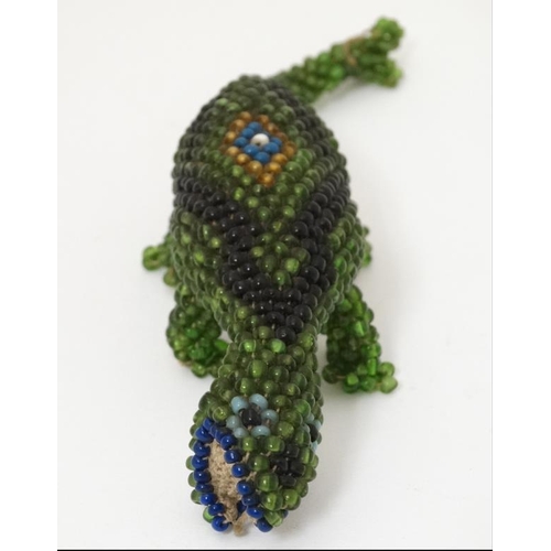 346 - Militaria : An Ottoman Prisoner of War small bead work Lizard , 6 1/2'' long .