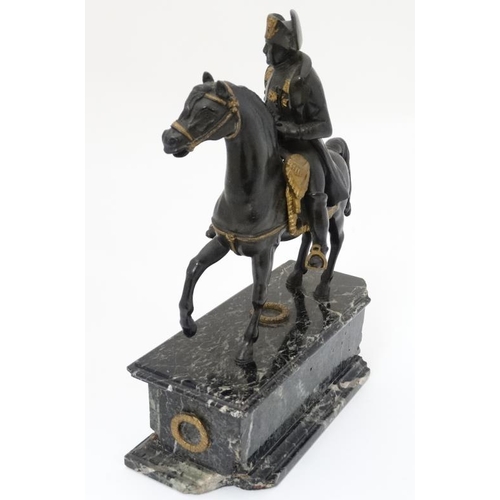 349A - Militaria : A bronze sculpture depicting Napoleon Bonaparte on horseback , affixed to a marble base ... 