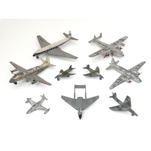 382 - A collection of 9 diecast 1960s and 70s Meccano ltd, Dinky Toy Aircraft to include a 704 Avro 'York'... 