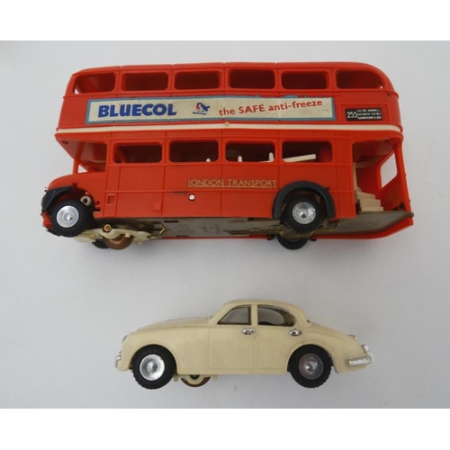 392 - Toy: A 1960s Tri-ang Minic motorway, number M1501C with double decker bus, in original box.