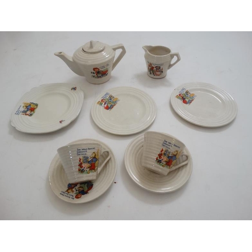 393 - Toy: a c1950s Child's toy '' Little Red Riding Hood '' tea set , comprising teapot, milk jug, 2 cups... 