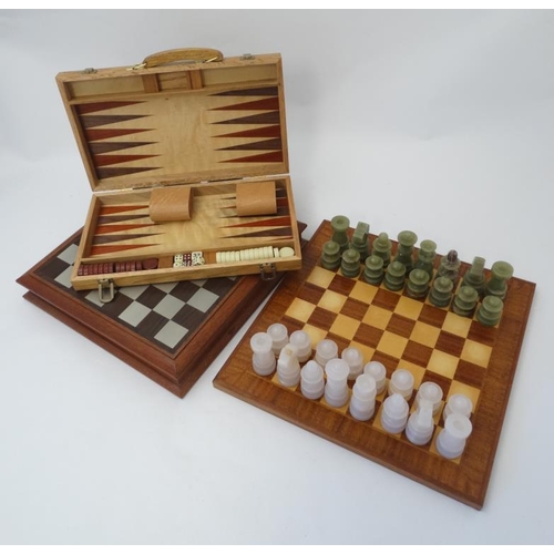 394 - A Royal Selangor '' Camelot '' Chess set in wooden case with board to top, together with a hardstone... 