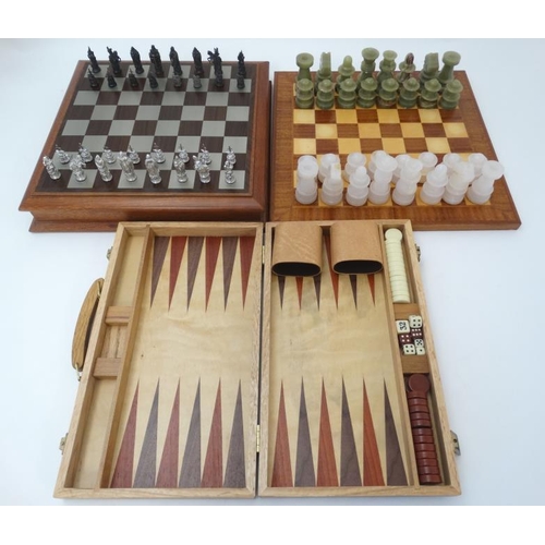 394 - A Royal Selangor '' Camelot '' Chess set in wooden case with board to top, together with a hardstone... 