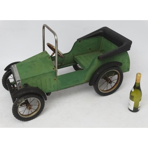 398 - A Child's metal pedal car in British Racing Green by Great Gizmos Ltd, modelled after a 1931 MG , wi... 