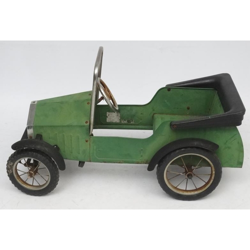 398 - A Child's metal pedal car in British Racing Green by Great Gizmos Ltd, modelled after a 1931 MG , wi... 