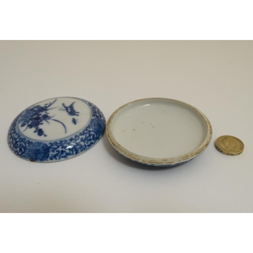 419 - A Chinese blue and white ink box and cover , decorated with butterflies and flowers to lid amid a sc... 