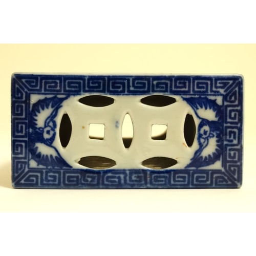 421 - A Chinese pierced blue and white flower brick/grasshopper box with stylised foliate decoration. With... 