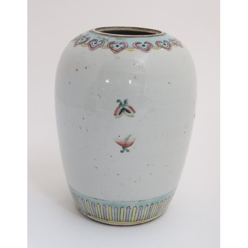 428 - A Chinese famille rose ginger jar, decorated in polychrome with flowers and fruit in a selection of ... 