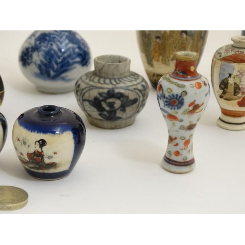 438 - A collection of 13 Chinese and Japanese small and miniature vases, to include blue and white, Satsum... 