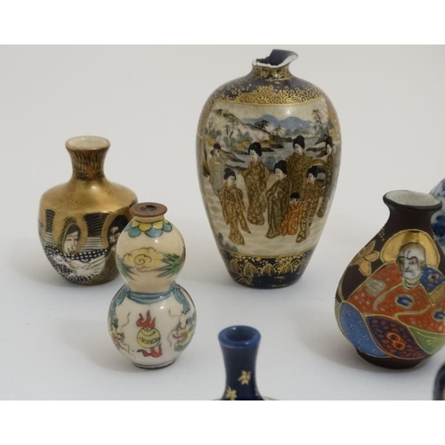 438 - A collection of 13 Chinese and Japanese small and miniature vases, to include blue and white, Satsum... 