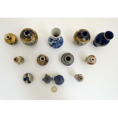 438 - A collection of 13 Chinese and Japanese small and miniature vases, to include blue and white, Satsum... 