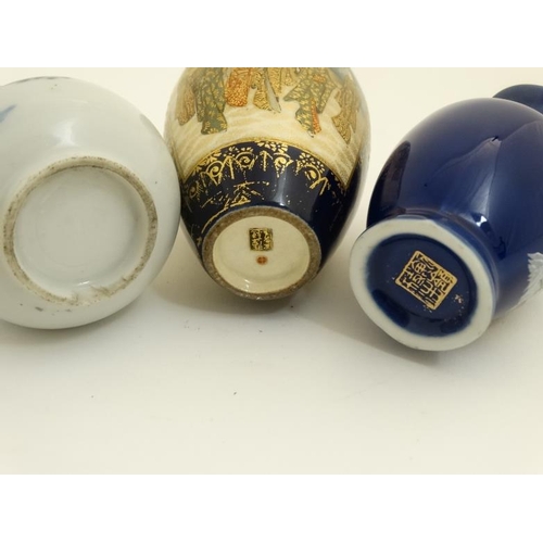 438 - A collection of 13 Chinese and Japanese small and miniature vases, to include blue and white, Satsum... 