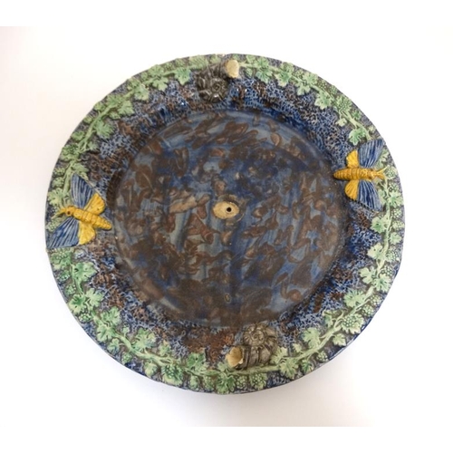 445 - A 19thC Thomas Sargent style majolica pallisy plate, decorated with shells and moths to side with gr... 