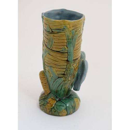 447 - A 21stC George Jones style Majolica 'Bird on Nest' vase having blue bird to side and bullrush decora... 