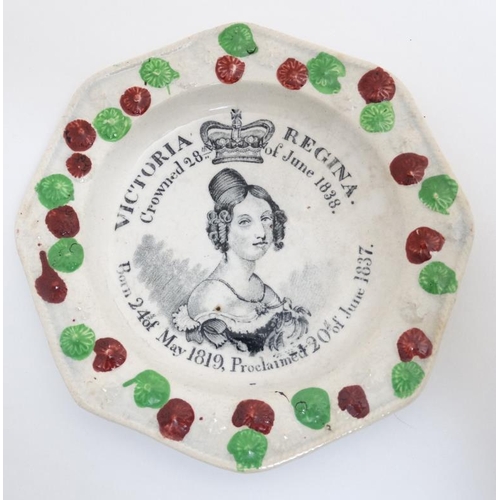 453 - A rare Victorian child's pottery plate of octagonal form with transfer printed image to centre comme... 