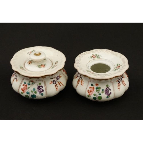 463 - A French Samson style standish comprising two inkwells, decorated with polychrome flowers on a white... 