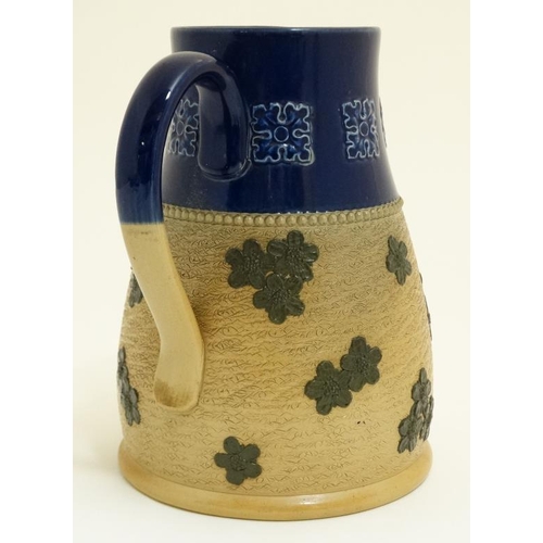 465 - A large Royal Doulton Lambeth Jug having cobalt blue banded top section with stylised leaves and sty... 