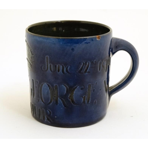 473 - A 1911 Brannam Pottery Coronation mug in cobalt blue , bears ''June 22nd 1911, Coronation King Georg... 