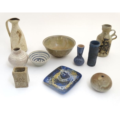 498 - A collection of 10 items of Studio pottery , comprising vases , bowls and dishes, to include example... 