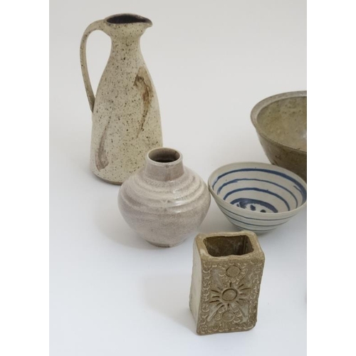 498 - A collection of 10 items of Studio pottery , comprising vases , bowls and dishes, to include example... 