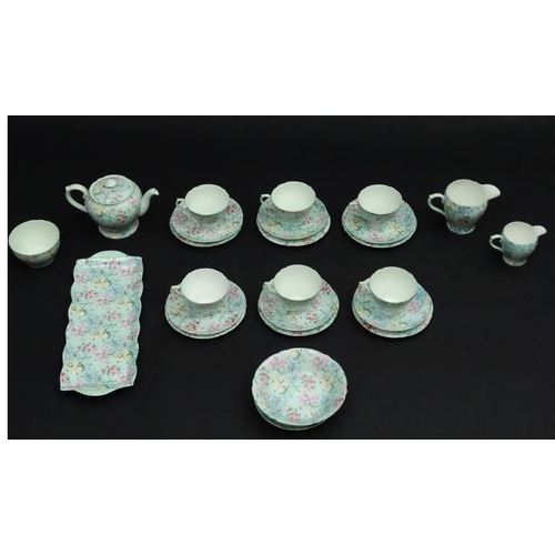 503 - A collection of Shelley '' Melody '' pattern tea wares, number 13453,  to include teapot, sugar bowl... 