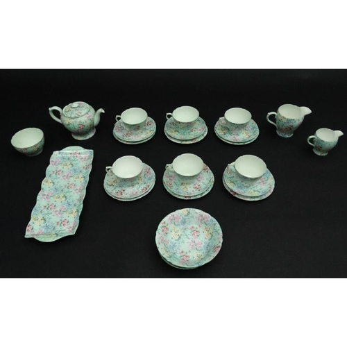 503 - A collection of Shelley '' Melody '' pattern tea wares, number 13453,  to include teapot, sugar bowl... 