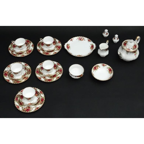 504 - A collection of Royal Albert '' Old Country Roses'' tea wares, to include teapot, 5 cups, 5 saucers,... 