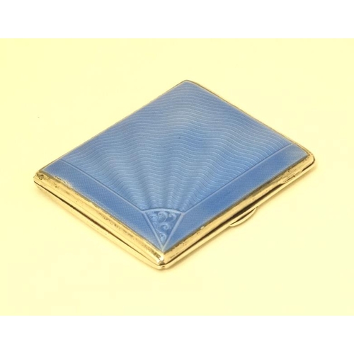 520 - An Art Deco silver cigarette case with engine turned and blue guilloché enamel decoration. Hallmarke... 