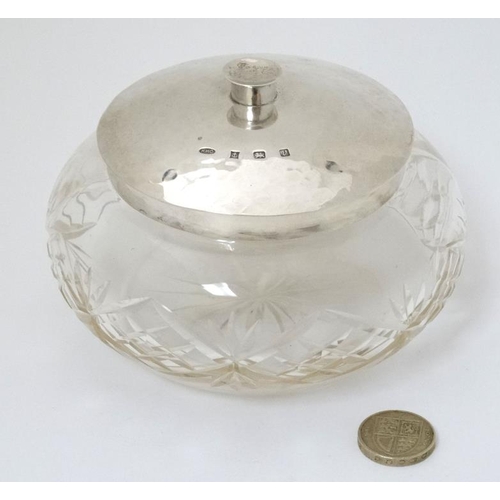 523 - A cut glass dressing table pot bowl with hammered silver top hallmarked Birmingham 1995 maker Keith ... 