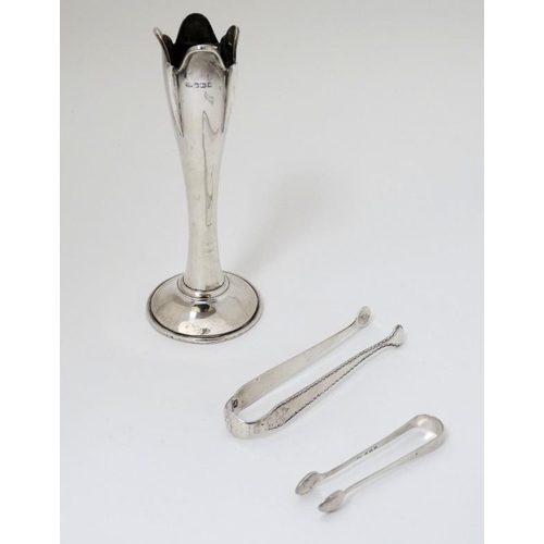 525 - 3 silver items comprising bud vase hallmarked Sheffield 1909, 19thC bright cut decorated sugar tongs... 