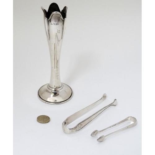 525 - 3 silver items comprising bud vase hallmarked Sheffield 1909, 19thC bright cut decorated sugar tongs... 