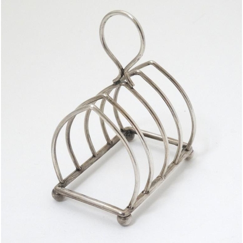 529 - A small silver toast rack hallmarked , London 1895 maker Henry Wilkinson & Co. (48g)