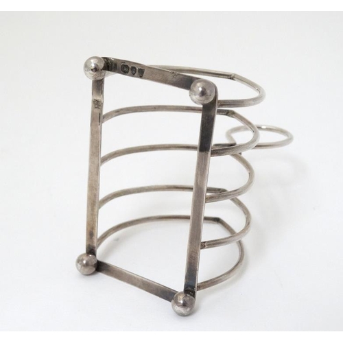 529 - A small silver toast rack hallmarked , London 1895 maker Henry Wilkinson & Co. (48g)