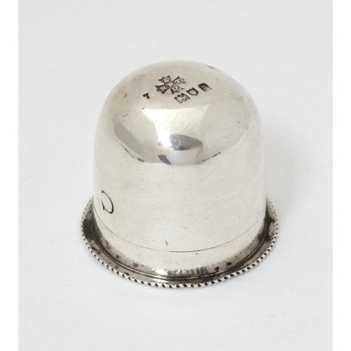 532 - A small silver box with screw base and domed cover, possibly a pyx / wafer box,  hallmarked London 1... 