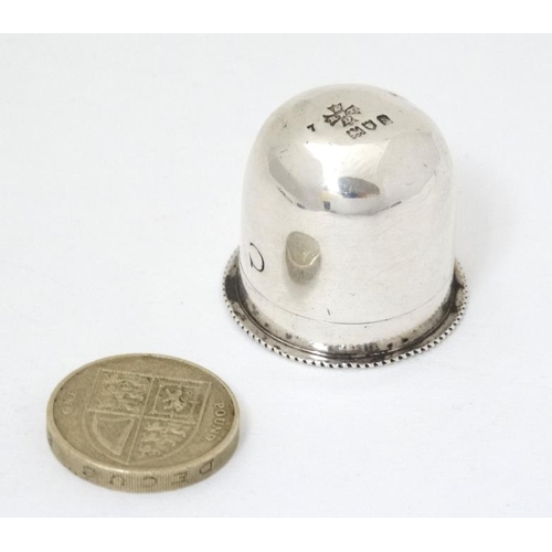 532 - A small silver box with screw base and domed cover, possibly a pyx / wafer box,  hallmarked London 1... 