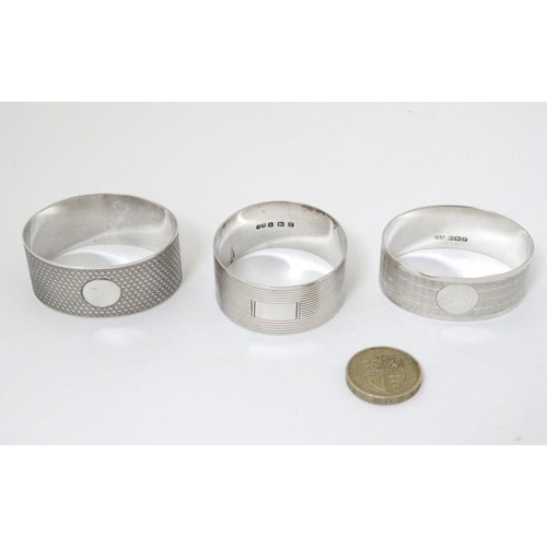 537 - 3 various silver napkin rings with engine turned decoration 1 x Birmingham 1929 maker William Devenp... 