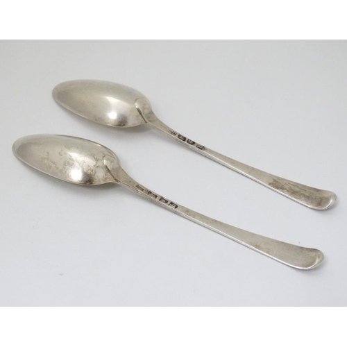 540 - A pair of 18thC silver bead edged table spoons hallmarked London 1777 maker Thomas Chawner  8 1/2'' ... 