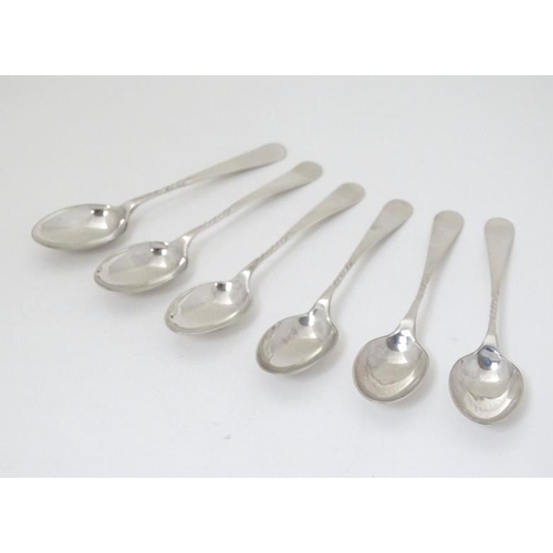 543 - A set of  6 silver teaspoons with twist decoration to handles. Hallmarked Sheffield 1898 teaspoons m... 