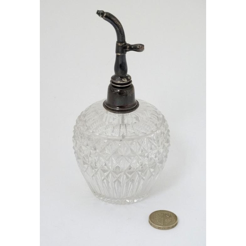 551 - A cut glass scent bottle with silver atomizer top hallmarked Birmingham 1896 maker George Unite. App... 