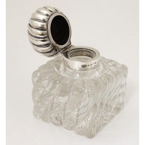 560 - A Victorian glass inkwell with silver hinged top hallmarked Birmingham 1887 maker Horton & Allday ap... 