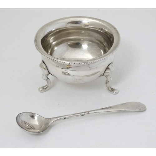 567 - A silver salt hallmarked Birmingham 1918 maker Harrison & Hipwood together with an associated silver... 