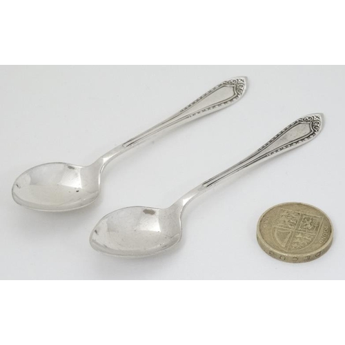 575 - A pair of silver coffee spoons hallmarked Birmingham 1931 maker Mappin & Webb Ltd 3 3/4'' long (18g)