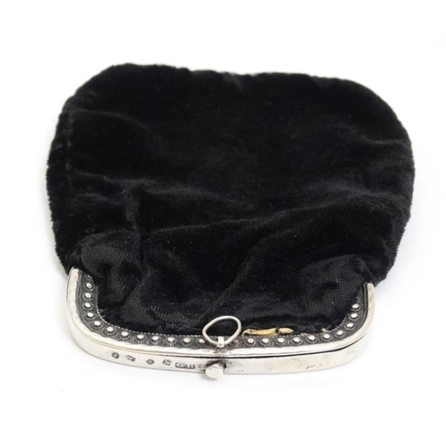 576 - A Geo III silver mounted ladies black velvet purse. Hallmarked Birmingham 1816 maker George Bower 4'... 