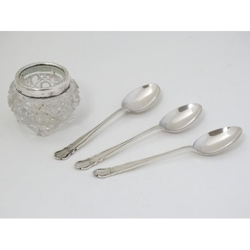 577 - A cut glass salt with silver rim hallmarked rim London 1910 together with 3 silver spoons hallmarked... 