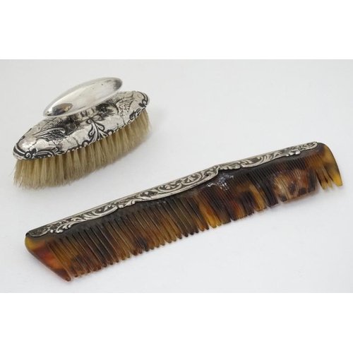 602 - A silver mounted nail brush hallmarked Birmingham 1899 maker Levi & Salaman together with a silver m... 